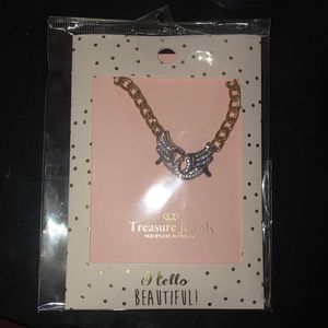 New never worn or opened angel wing necklace